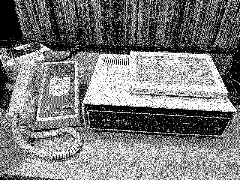 An AT&T Sceptre posing with Comdial 3500S phone.